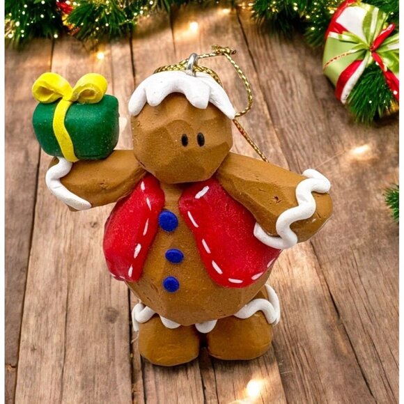 Vintage Gingerbread Man Christmas Tree Ornament Holding Gift Carved Clay Style - Picture 1 of 8
